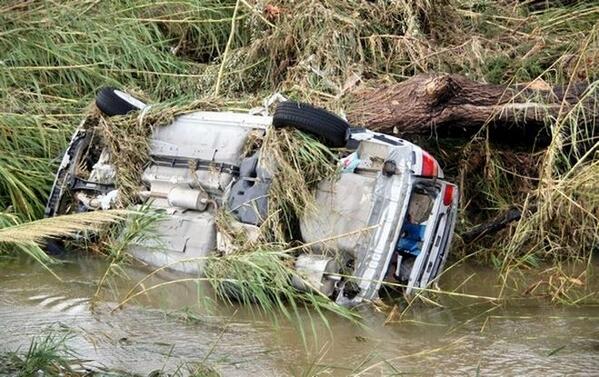 car in floods greece
