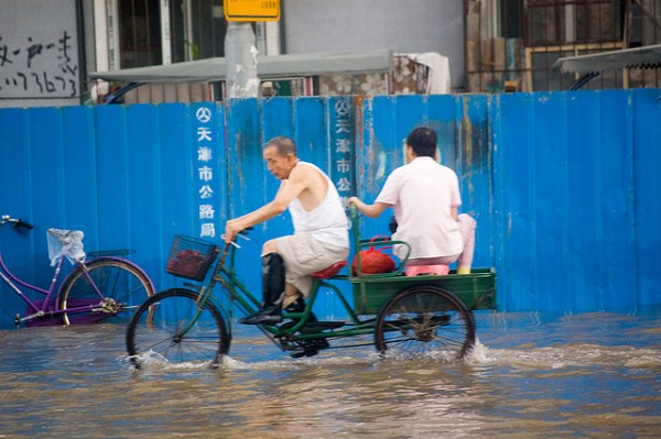 File photo: Getting around during floods in China. Phot credit