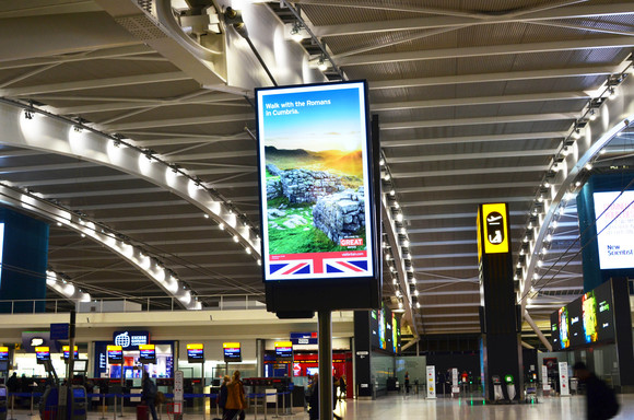 Heathrow Airport - Posters promoting tourism in flood-hit areas of England and Scotland. Photo: Heathrow Airport